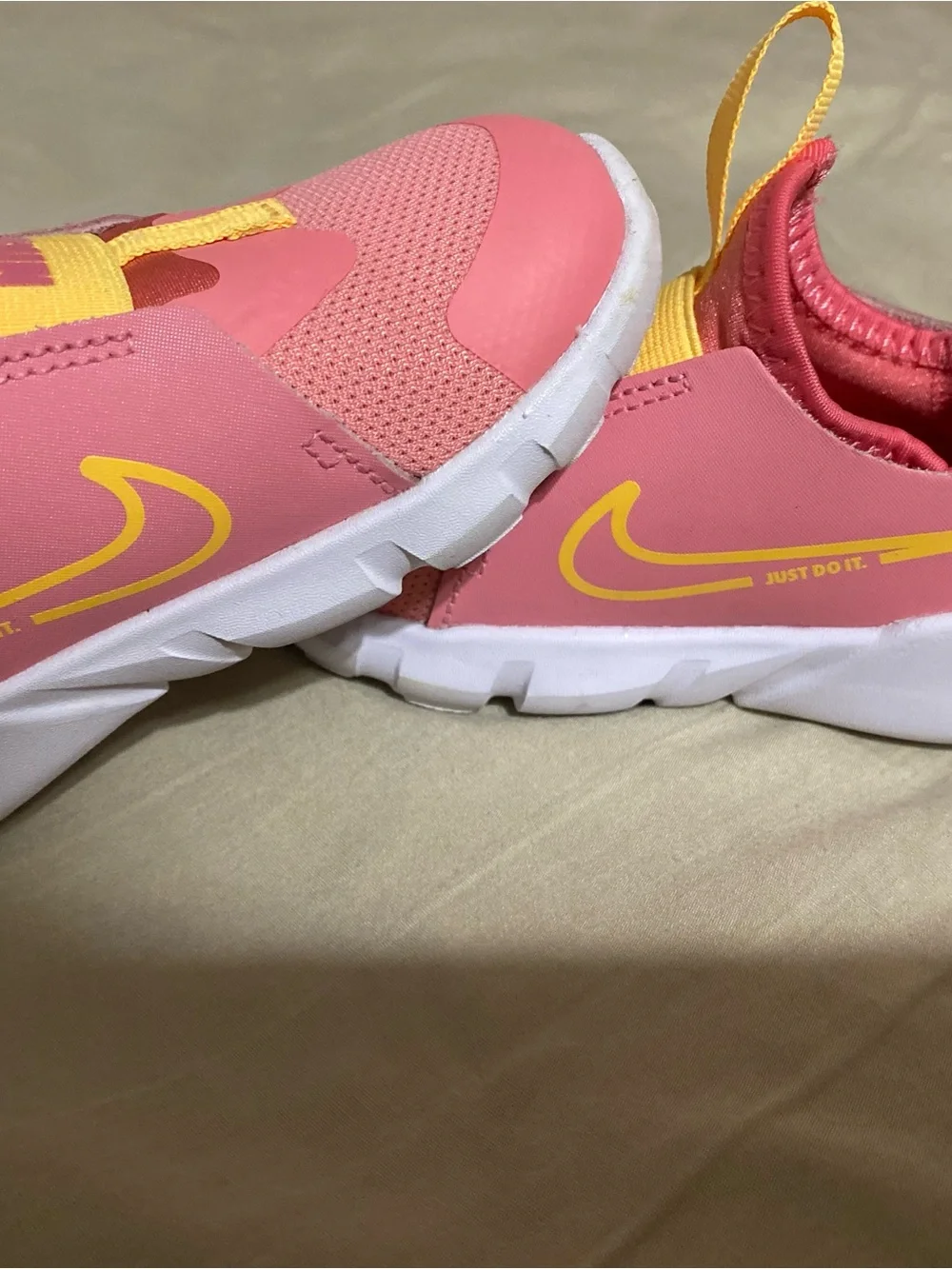 Nike Kids Pink Slip-On Sneakers with Yellow Accents